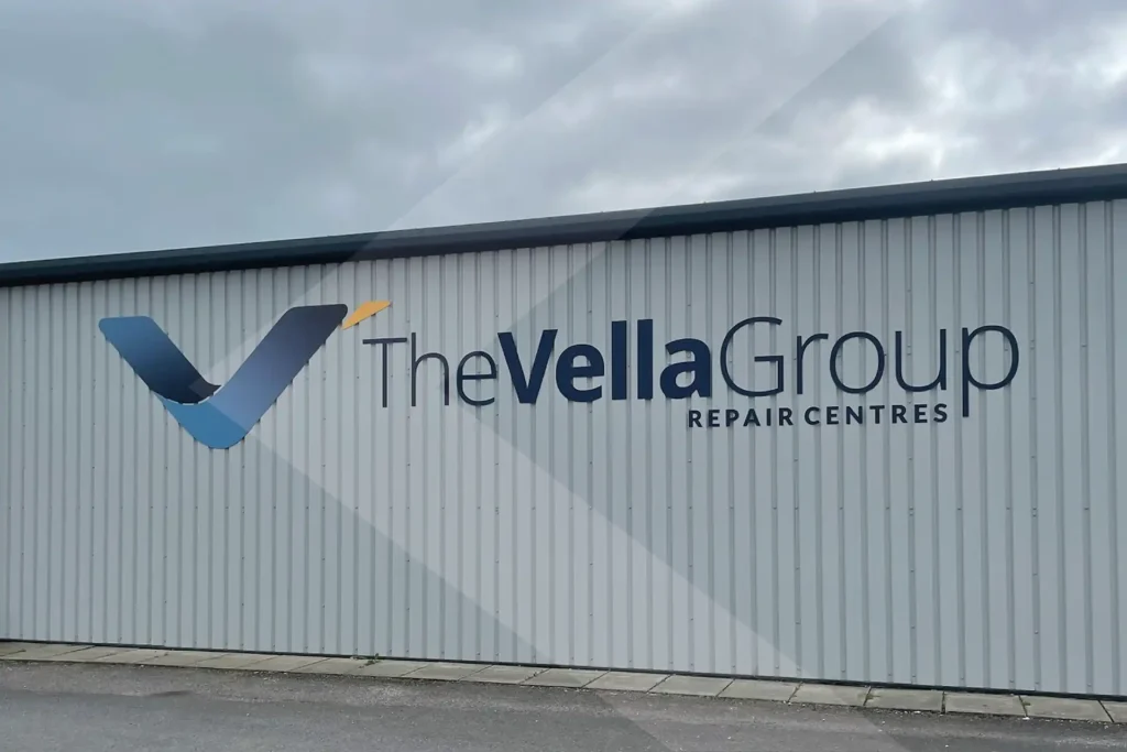 Vella Group Repair Centre Workington signage